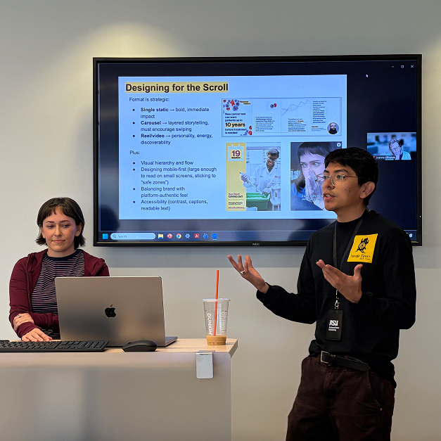 The RCO social media team gives a presentation at a podium with a slide on a video screen in the background